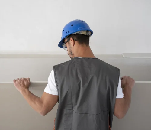 medium-shot-man-wearing-helmet-job